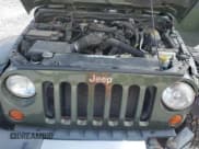 ✅ 2009 Jeep Wrangler Sahara • VIN: 1J8FA54159L751882 • Lot: 69022225. Listed on Copart with 110,131 mi. Free auction sales archive from the USA and detailed vehicle history report at DreamBid. Image 11.