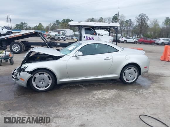✅ 2004 Lexus SC 430 • VIN: JTHFN48Y840053546 • Lot: 41945488. Wystawiony na IAAI z przebiegiem 167 846 mil. Bezpłatny archiwum sprzedaży aukcyjnych z USA i szczegółowy raport historii pojazdu na DreamBid. Zdjęcie 14.