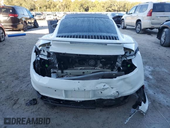 ✅ 2021 Porsche 911 Turbo S • VIN: WP0AD2A98MS257662 • Lot: 83297714. Wystawiony na Copart z przebiegiem 72 267 mil. Bezpłatny archiwum sprzedaży aukcyjnych z USA i szczegółowy raport historii pojazdu na DreamBid. Zdjęcie 6.