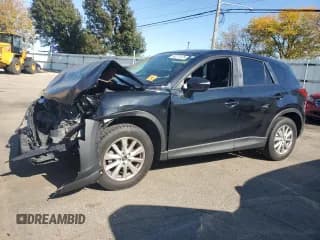 ✅ 2016 Mazda CX-5 Touring • VIN: JM3KE4CY2G0673831 • Lot: 90272475. Wystawiony na Copart z przebiegiem Nie podano. Bezpłatny archiwum sprzedaży aukcyjnych z USA i szczegółowy raport historii pojazdu na DreamBid. Zdjęcie 1.