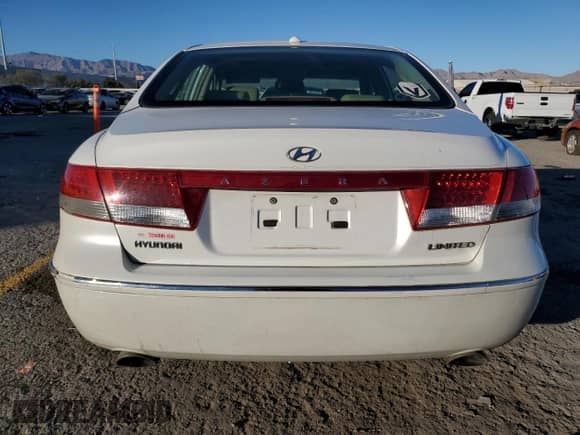2007 Hyundai Azera SE z VIN KMHFC46F77A238884, wystawiony jako Copart lot #88598615 z przebiegiem 153 755 mil mil oraz Szkoda całkowita • Salvage title. Historia ofert i sprzedaży dostępna na DreamBid. Obrazek 6.