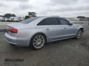 ✅ 2015 Audi A8 4.0T • VIN: WAU32AFD2FN019083 • Lot: 45976045. Listed on Copart with 83,724 mi. Free auction sales archive from the USA and detailed vehicle history report at DreamBid. Image 3.