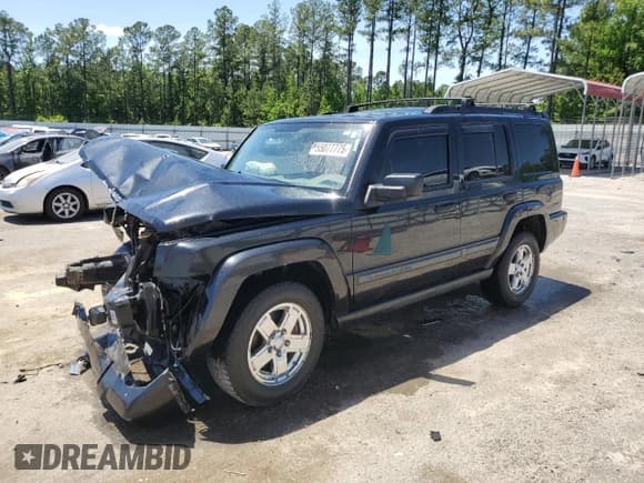 ✅ 2009 Jeep Commander Sport • VIN: 1J8HG48K99C551852 • Lot: 55077775. Listed on Copart with 157,829 mi. Free auction sales archive from the USA and detailed vehicle history report at DreamBid. Image 1.