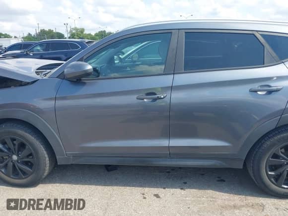2019 Hyundai Tucson Value with VIN KM8J33A49KU955529, listed as a IAAI auction lot 42947554 with 81,614 mi miles and . Bid and sale history available at DreamBid. Image 14.