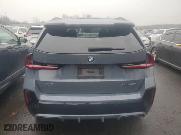 ✅ 2024 BMW X1 xDrive28i • VIN: WBX73EF07R5Y79901 • Лот: 91943095. Опубликован ранее на Copart с пробегом 26 800 миль. Бесплатный доступ к архиву аукционных продаж из США и подробный отчёт об истории автомобиля на DreamBid. Изображение 6.