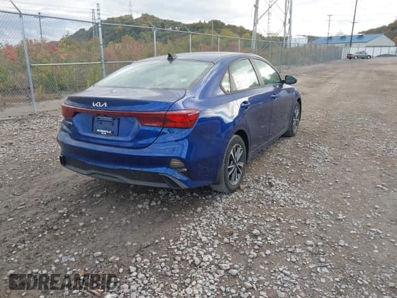 ✅ 2023 Kia Forte LXS • VIN: 3KPF24AD1PE554503 • Lot: 43521838. Listed on IAAI with 15,872 mi. Free auction sales archive from the USA and detailed vehicle history report at DreamBid. Image 4.