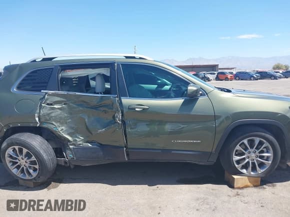 ✅ 2021 Jeep Cherokee Latitude Lux • VIN: 1C4PJLMX3MD180402 • Lot: 42570458. Wystawiony na IAAI z przebiegiem 63 067 mil. Bezpłatny archiwum sprzedaży aukcyjnych z USA i szczegółowy raport historii pojazdu na DreamBid. Zdjęcie 13.