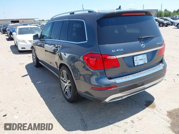 ✅ 2014 Mercedes-Benz GL 450 • VIN: 4JGDF7CE0EA319735 • Лот: 43159331. Опубликован ранее на IAAI с пробегом 81 718 миль. Бесплатный доступ к архиву аукционных продаж из США и подробный отчёт об истории автомобиля на DreamBid. Изображение 3.