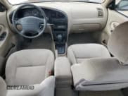 ✅ 2003 Kia Spectra • VIN: KNAFB121035212787 • Lot: 63602485. Listed on Copart with 76,445 mi. Free auction sales archive from the USA and detailed vehicle history report at DreamBid. Image 8.