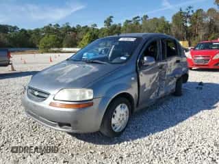2006 Chevrolet Aveo LS z VIN KL1TD66646B526653, wystawiony jako Copart lot #84706574 z przebiegiem 102 701 mil mil oraz Szkoda całkowita • Salvage title. Historia ofert i sprzedaży dostępna na DreamBid. Obrazek 1.