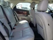 ✅ 2013 Jaguar XJ • VIN: SAJWA1C7XD8V56444 • Лот: 58355235. Опубликован ранее на Copart с пробегом 58 784 миль. Бесплатный доступ к архиву аукционных продаж из США и подробный отчёт об истории автомобиля на DreamBid. Изображение 10.