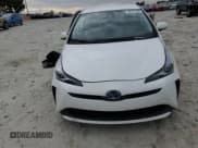 ✅ 2022 Toyota Prius LE • VIN: JTDKAMFU6N3182140 • Lot: 82677565. Wystawiony na Copart z przebiegiem 79 813 mil. Bezpłatny archiwum sprzedaży aukcyjnych z USA i szczegółowy raport historii pojazdu na DreamBid. Zdjęcie 5.