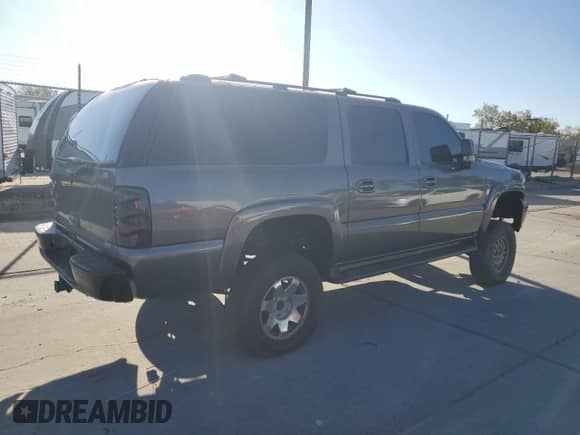 2001 Chevrolet Suburban LT с VIN 1GNEC16T31J232681, выставлен на аукционе Copart как лот 73243624 с пробегом Не указан миль и Списание • Salvage title. История ставок и продаж доступна на DreamBid. Изображение 3.