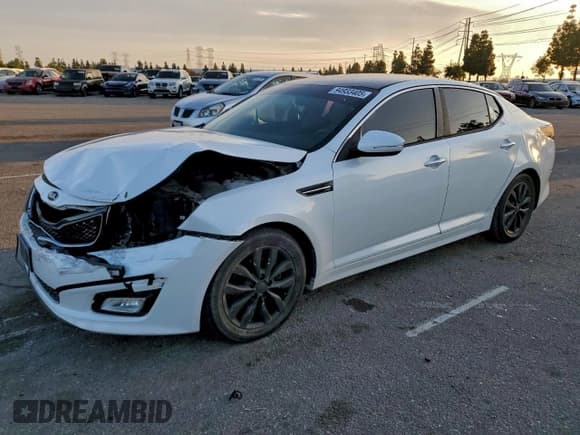 ✅ 2014 Kia Optima LX • VIN: 5XXGM4A74EG302712 • Lot: 94933405. Listed on Copart with 118,254 mi. Free auction sales archive from the USA and detailed vehicle history report at DreamBid. Image 1.