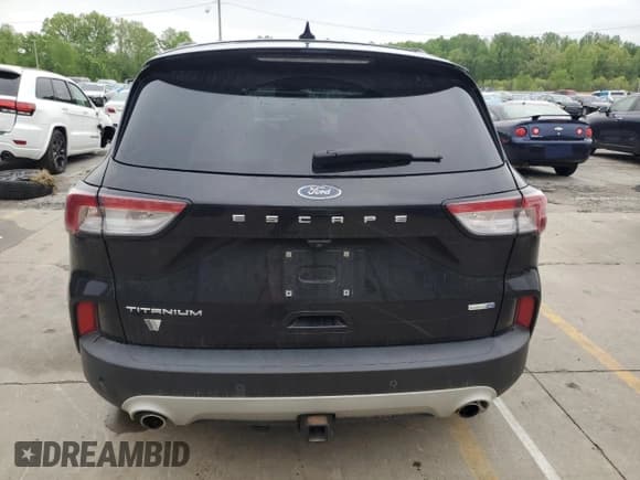 ✅ 2020 Ford Escape Titanium • VIN: 1FMCU9J9XLUA29209 • Lot: 54379545. Listed on Copart with 75,412 mi. Free auction sales archive from the USA and detailed vehicle history report at DreamBid. Image 6.