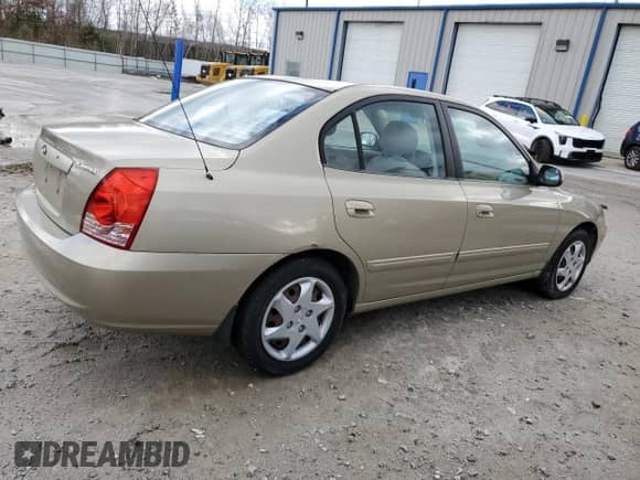 2003 Hyundai Elantra GLS z VIN KMHDN46D26U345516, wystawiony jako Copart lot #82101734 z przebiegiem 41 782 mil mil oraz Czysty tytuł • Clean title. Historia ofert i sprzedaży dostępna na DreamBid. Obrazek 3.