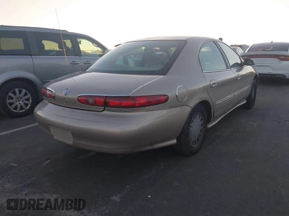 ✅ 1999 Mercury Sable LS • VIN: 1MEFM53SXXA647145 • Lot: 43602157. Listed on IAAI with 184,332 mi. Free auction sales archive from the USA and detailed vehicle history report at DreamBid. Image 4.