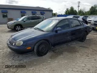 ✅ 1998 Ford Taurus LX • VIN: 1FAFP52U8WA121905 • Лот: 58489045. Опубликован ранее на Copart с пробегом 153 254 миль. Бесплатный доступ к архиву аукционных продаж из США и подробный отчёт об истории автомобиля на DreamBid. Изображение 1.