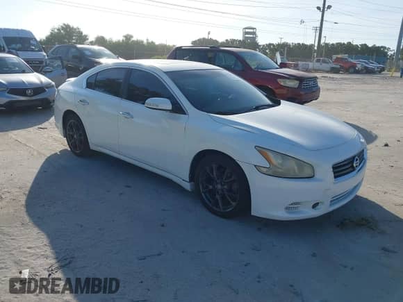 2012 Nissan Maxima S z VIN 1N4AA5APXCC849233, wystawiony jako IAAI lot #42915963 z przebiegiem 119 679 mil mil oraz . Historia ofert i sprzedaży dostępna na DreamBid. Obrazek 1.