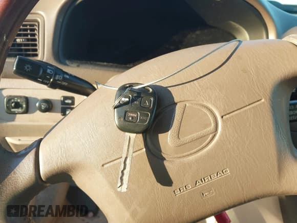 ✅ 2001 Lexus ES 300 • VIN: JT8BF28G110335644 • Lot: 43638293. Listed on IAAI with 124,923 mi. Free auction sales archive from the USA and detailed vehicle history report at DreamBid. Image 11.