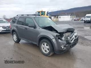 ✅ 2011 Ford Escape XLT • VIN: 1FMCU9D72BKA31041 • Lot: 43800976. Listed on IAAI with 148,075 mi. Free auction sales archive from the USA and detailed vehicle history report at DreamBid. Image 1.