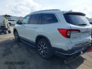 ✅ 2021 Honda Pilot Touring 8-Passenger • VIN: 5FNYF6H95MB091006 • Лот: 42509101. Опубликован ранее на IAAI с пробегом 43 879 миль. Бесплатный доступ к архиву аукционных продаж из США и подробный отчёт об истории автомобиля на DreamBid. Изображение 3.