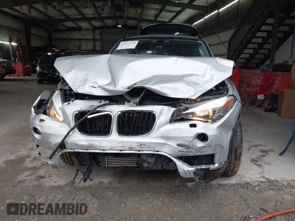 ✅ 2014 BMW X1 xDrive28i • VIN: WBAVL1C50EVY12027 • Lot: 43537124. Listed on IAAI with 84,465 mi. Free auction sales archive from the USA and detailed vehicle history report at DreamBid. Image 6.