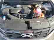 2023 Hyundai Tucson Blue z VIN KM8JBCA18PU123471, wystawiony jako Copart lot #85730945 z przebiegiem 29 261 mil mil oraz Szkoda całkowita • Salvage title. Historia ofert i sprzedaży dostępna na DreamBid. Obrazek 12.