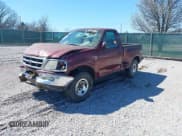 ✅ 1998 Ford F-150 • VIN: 2FTZF08W5WCA88933 • Lot: 41811179. Listed on IAAI with Not provided. Free auction sales archive from the USA and detailed vehicle history report at DreamBid. Image 2.