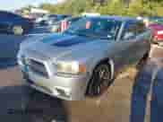 2014 Dodge Charger SXT with VIN 2C3CDXHG2EH239214, listed as a IAAI auction lot 43595966 with 219,931 mi miles and . Bid and sale history available at DreamBid. Image 2.