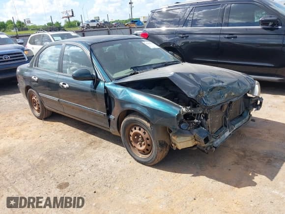 ✅ 2002 Kia Optima LX • VIN: KNAGD126025161929 • Лот: 42203737. Опубликован ранее на IAAI с пробегом 152 254 миль. Бесплатный доступ к архиву аукционных продаж из США и подробный отчёт об истории автомобиля на DreamBid. Изображение 1.