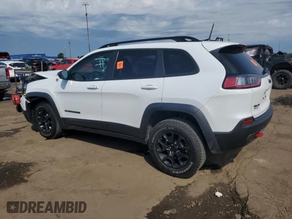✅ 2023 Jeep Cherokee Trailhawk • VIN: 1C4PJMBN0PD106916 • Lot: 61921595. Wystawiony na Copart z przebiegiem 16 768 mil. Bezpłatny archiwum sprzedaży aukcyjnych z USA i szczegółowy raport historii pojazdu na DreamBid. Zdjęcie 2.