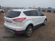 ✅ 2015 Ford Escape Titanium • VIN: 1FMCU0J93FUB60403 • Lot: 43720754. Wystawiony na IAAI z przebiegiem 147 823 mil. Bezpłatny archiwum sprzedaży aukcyjnych z USA i szczegółowy raport historii pojazdu na DreamBid. Zdjęcie 4.
