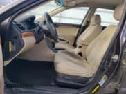 ✅ 2009 Hyundai Sonata GLS • VIN: 5NPET46C69H575001 • Лот: 83342234. Опубликован ранее на Copart с пробегом 170 202 миль. Бесплатный доступ к архиву аукционных продаж из США и подробный отчёт об истории автомобиля на DreamBid. Изображение 7.