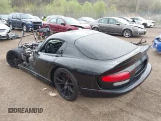 ✅ 1999 Dodge Viper GTS • VIN: 1B3ER69E0XV502941 • Lot: 42128115. Listed on IAAI with Not provided. Free auction sales archive from the USA and detailed vehicle history report at DreamBid. Image 3.