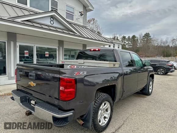 ✅ 2015 Chevrolet Silverado 1500 LT • VIN: 3GCUKREC5FG214411 • Лот: 94967675. Опубликован ранее на Copart с пробегом 148 914 миль. Бесплатный доступ к архиву аукционных продаж из США и подробный отчёт об истории автомобиля на DreamBid. Изображение 4.