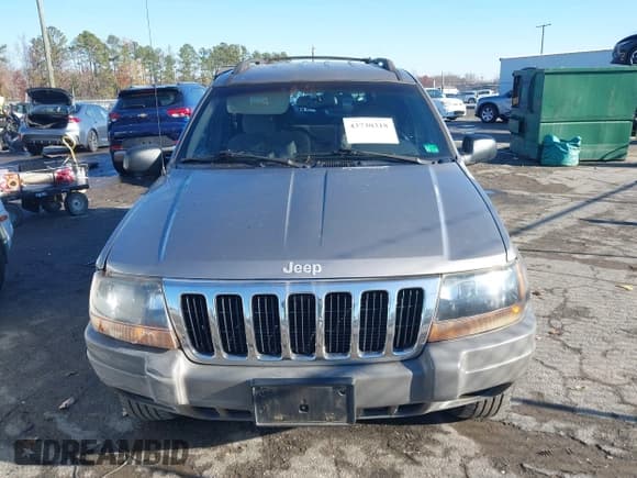 ✅ 1999 Jeep Grand Cherokee Laredo • VIN: 1J4GW58S1XC520727 • Lot: 43730318. Wystawiony na IAAI z przebiegiem 154 356 mil. Bezpłatny archiwum sprzedaży aukcyjnych z USA i szczegółowy raport historii pojazdu na DreamBid. Zdjęcie 12.