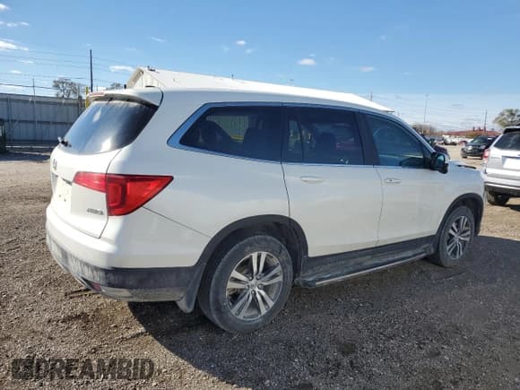 ✅ 2018 Honda Pilot EX-L • VIN: 5FNYF6H60JB043334 • Лот: 92035645. Опубликован ранее на Copart с пробегом 129 166 миль. Бесплатный доступ к архиву аукционных продаж из США и подробный отчёт об истории автомобиля на DreamBid. Изображение 3.