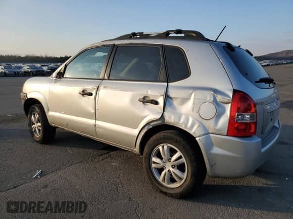 2009 Hyundai Tucson GLS z VIN KM8JM12B29U977896, wystawiony jako Copart lot #81466764 z przebiegiem 168 214 mil mil oraz Szkoda całkowita • Salvage title. Historia ofert i sprzedaży dostępna na DreamBid. Obrazek 2.
