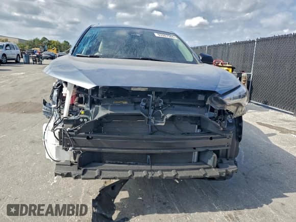 ✅ 2023 Toyota Corolla Cross L • VIN: 7MUAAAAG7PV055643 • Lot: 93307565. Listed on Copart with 32,913 mi. Free auction sales archive from the USA and detailed vehicle history report at DreamBid. Image 5.