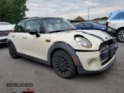 ✅ 2017 MINI Hardtop 4 Door Cooper • VIN: WMWXU1C32H2F77420 • Lot: 62735854. Listed on Copart with 74,500 mi. Free auction sales archive from the USA and detailed vehicle history report at DreamBid. Image 4.