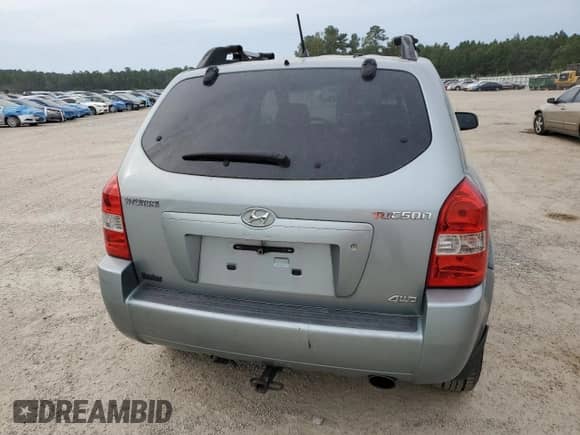 2006 Hyundai Tucson GL z VIN KM8JM72B26U292618, wystawiony jako Copart lot #71381784 z przebiegiem 208 371 mil mil oraz Szkoda całkowita • Salvage title. Historia ofert i sprzedaży dostępna na DreamBid. Obrazek 6.