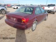 ✅ 2002 Saturn SL • VIN: 1G8ZF52822Z165725 • Lot: 43860858. Listed on IAAI with 191,469 mi. Free auction sales archive from the USA and detailed vehicle history report at DreamBid. Image 4.