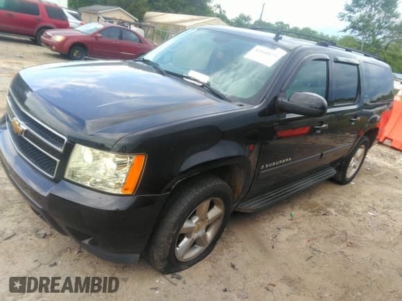 ✅ 2007 Chevrolet Suburban LTZ • VIN: 3GNFC16097G247674 • Lot: 42168577. Listed on IAAI with 217,864 mi. Free auction sales archive from the USA and detailed vehicle history report at DreamBid. Image 2.