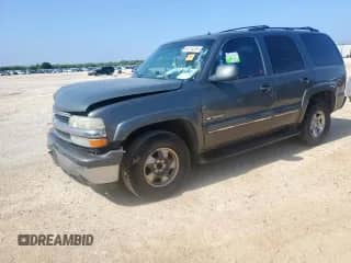 2002 Chevrolet Tahoe LT с VIN 1GNEC13ZX2J205777, выставлен на аукционе Copart как лот 65010255 с пробегом Не указан миль и Списание • Salvage title. История ставок и продаж доступна на DreamBid. Изображение 1.