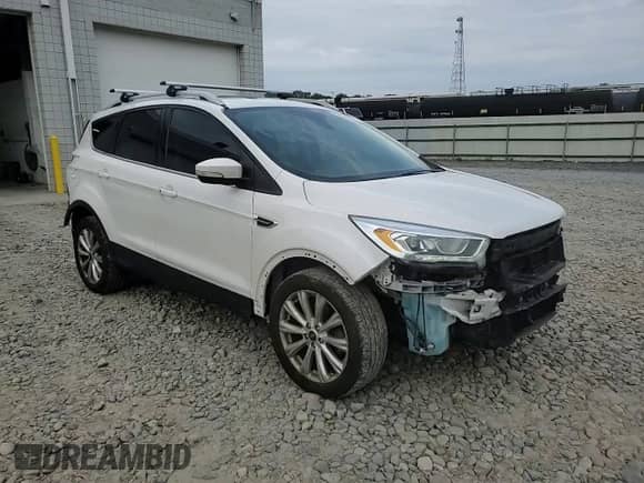 2017 Ford Escape Titanium с VIN 1FMCU9J96HUC05437, выставлен на аукционе Copart как лот 80256605 с пробегом 175 408 миль миль и Списание • Salvage title. История ставок и продаж доступна на DreamBid. Изображение 15.