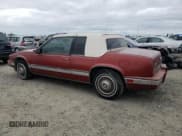 ✅ 1986 Cadillac Eldorado • VIN: 1G6EL5784GU616263 • Lot: 48741325. Wystawiony na Copart z przebiegiem 59 213 mil. Bezpłatny archiwum sprzedaży aukcyjnych z USA i szczegółowy raport historii pojazdu na DreamBid. Zdjęcie 2.