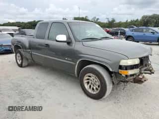 2002 Chevrolet Silverado 1500 LS z VIN 2GCEC19T921344756, wystawiony jako Copart lot #72798354 z przebiegiem 157 700 mil mil oraz Szkoda całkowita • Salvage title. Historia ofert i sprzedaży dostępna na DreamBid. Obrazek 4.