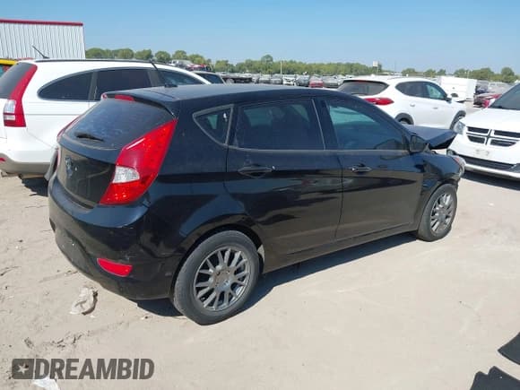✅ 2014 Hyundai Accent GS • VIN: KMHCT5AE0EU176019 • Lot: 43468973. Listed on IAAI with 128,055 mi. Free auction sales archive from the USA and detailed vehicle history report at DreamBid. Image 4.