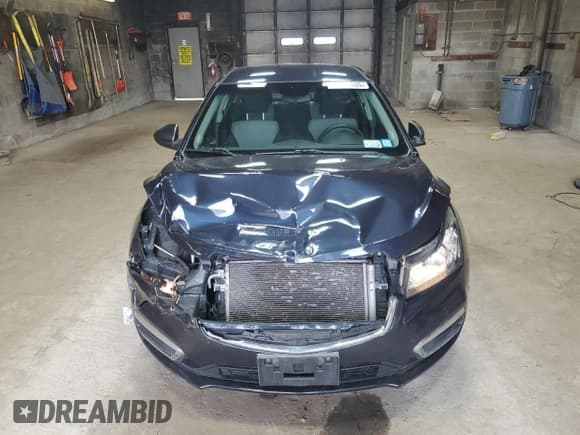 ✅ 2016 Chevrolet Cruze LS • VIN: 1G1PB5SGXG7221728 • Lot: 53065405. Listed on Copart with 47,605 mi. Free auction sales archive from the USA and detailed vehicle history report at DreamBid. Image 5.